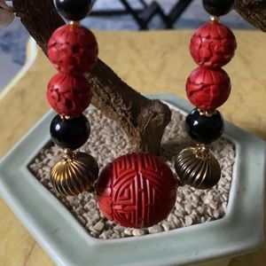 Vintage engraved cinnabar & black coral necklace
